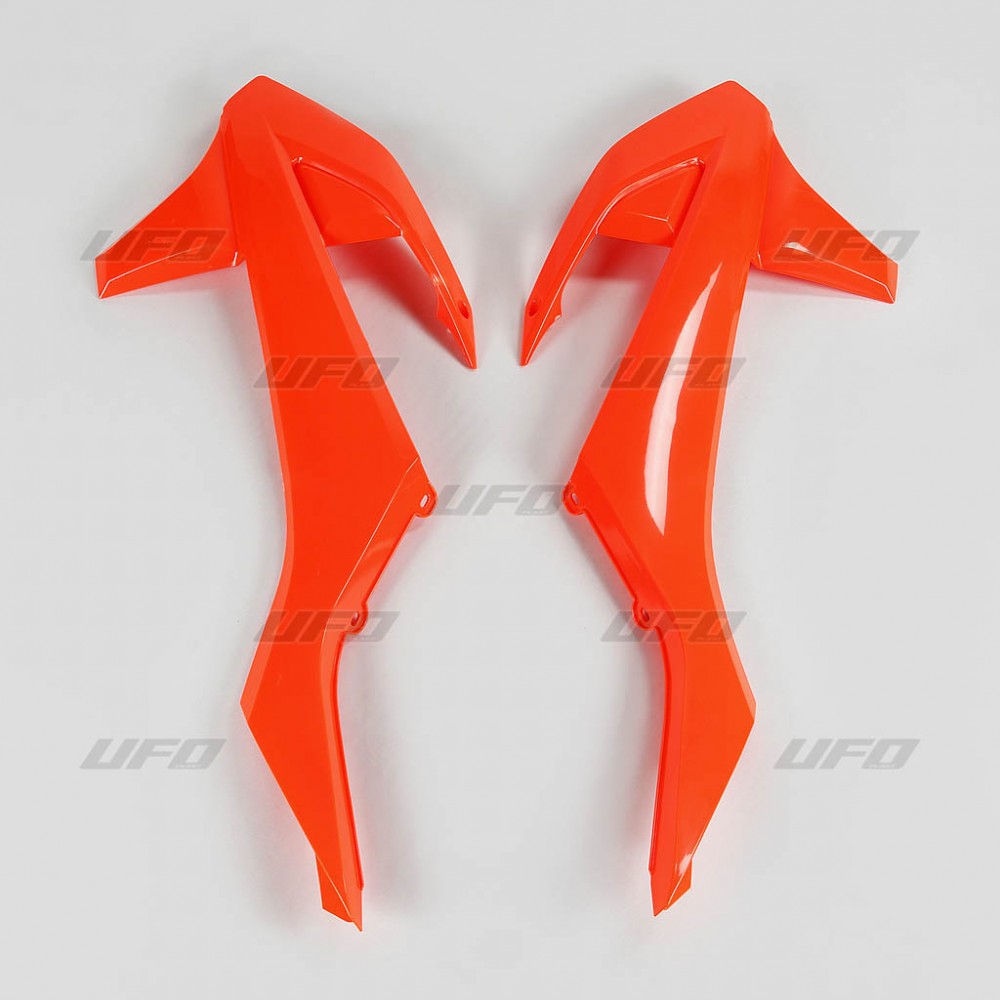 UFO kryty chladiče KTM SX/SXF 16-18 (kromě SX 250 16), EXC/EXCF TPI 17-19, SX/SXF 16-18, EXC/EXC-F 17-19 barva oranžová fluorescenční (UFO kryty)