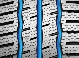 Klikatý design drážek a členité ramenní drážky účinně odvádějí vodu a sníh, což zlepšuje ovladatelnost za mokrého a zasněženého počasí.